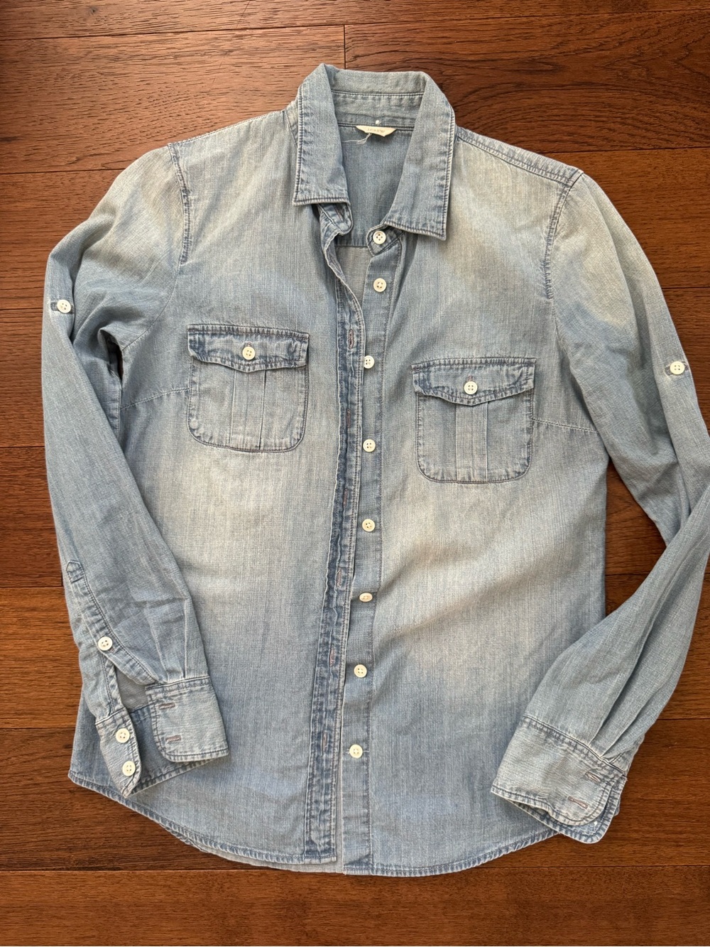 Gently used J. Crew Light Wash Denim Button-Down Shirt. Size 0. No tags!